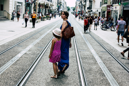 Reims France July 23, 2018 View of unknowns people walking in the street of Reims in the afternoonのeditorial素材
