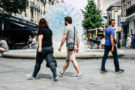 Reims France July 23, 2018 View of unknowns people walking in the street of Reims in the afternoonのeditorial素材