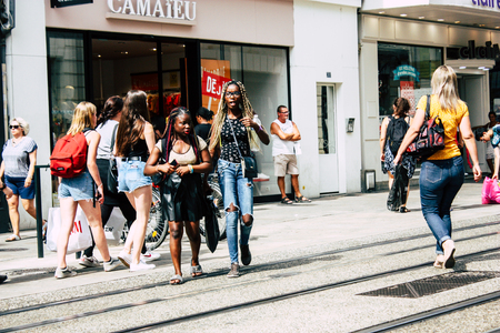 Reims France July 23, 2018 View of unknowns people walking in the street of Reims in the afternoonのeditorial素材