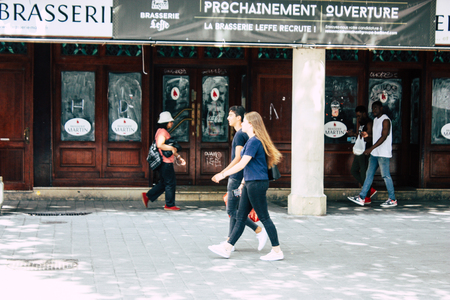 Reims France July 23, 2018 View of unknowns people walking in the street of Reims in the afternoonのeditorial素材