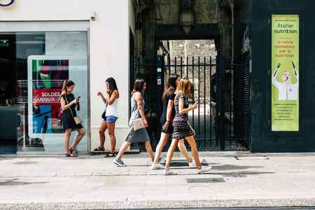 Reims France July 23, 2018 View of unknowns people walking in the street of Reims in the afternoonのeditorial素材