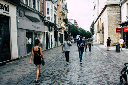 Reims France July 23, 2018 View of unknowns people walking in the street of Reims in the afternoonのeditorial素材