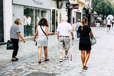 Reims France July 23, 2018 View of unknowns people walking in the street of Reims in the afternoonのeditorial素材