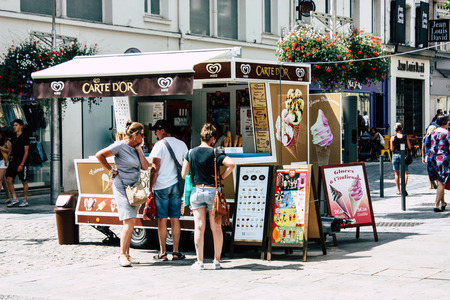 Reims France July 23, 2018 View of unknowns people walking in the street of Reims in the afternoonのeditorial素材