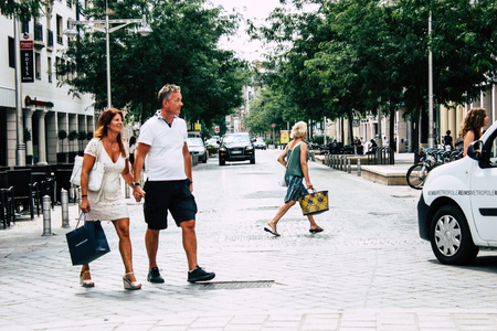 Reims France July 23, 2018 View of unknowns people walking in the street of Reims in the afternoonのeditorial素材