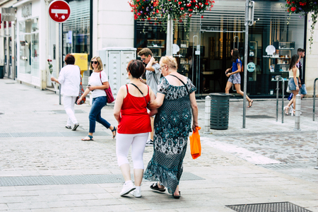 Reims France July 23, 2018 View of unknowns people walking in the street of Reims in the afternoonのeditorial素材
