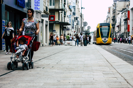 Reims France July 23, 2018 View of unknowns people walking in the street of Reims in the afternoonのeditorial素材