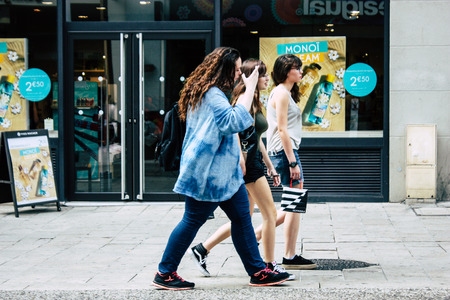 Reims France July 23, 2018 View of unknowns people walking in the street of Reims in the afternoonのeditorial素材