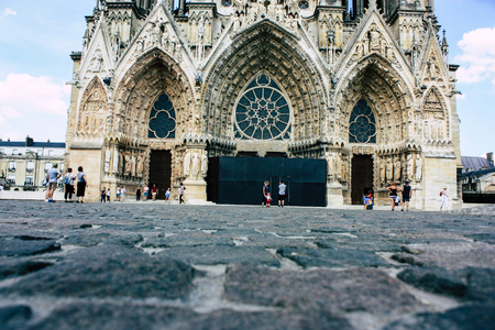 Reims France July 16, 2018 View of unknown people walking front the Notre Dame cathedral in Reims in the afternoonのeditorial素材