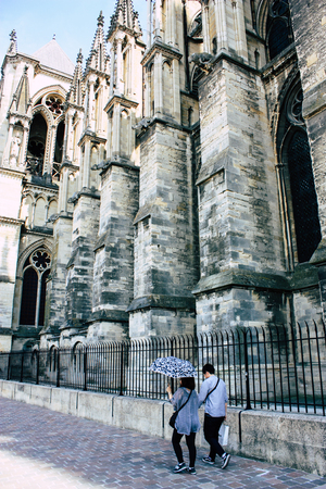 Reims France July 16, 2018 View of unknown people walking front the Notre Dame cathedral in Reims in the afternoonのeditorial素材
