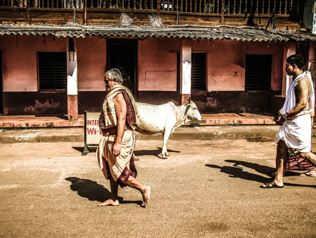 Gokarna Karnataka India October 30, 2017 View of unknown people walking in the main street of Gokarna town in the morningのeditorial素材