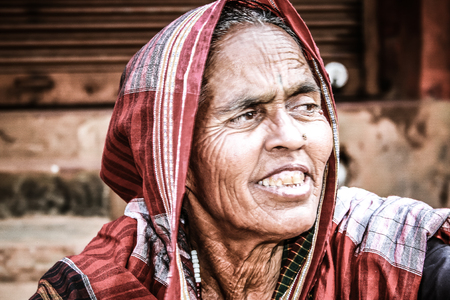 Gokarna Karnataka India November 01, 2017 Portrait of unknown people selling flowers in the street of Gokarna town in the eveningのeditorial素材