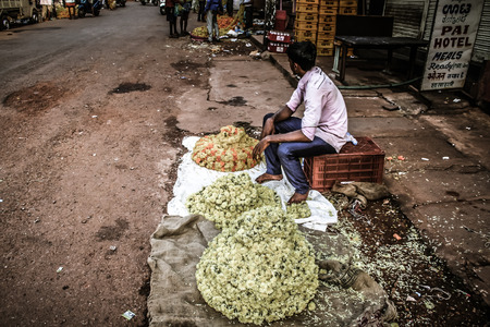 Gokarna Karnataka India November 01, 2017 Portrait of unknown people selling flowers in the street...