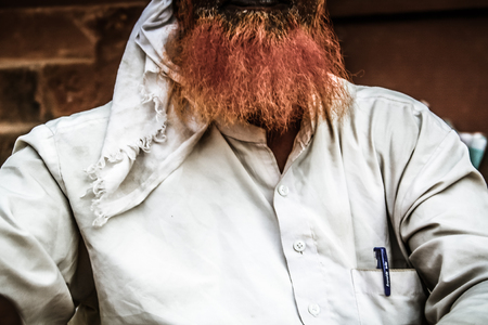 Gokarna Karnataka India November 01, 2017 Portrait of unknown people selling flowers in the street of Gokarna town in the eveningのeditorial素材