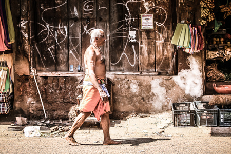 Gokarna Karnataka India October 30, 2017 View of unknown people walking in the main street of Gokarna town in the morningのeditorial素材
