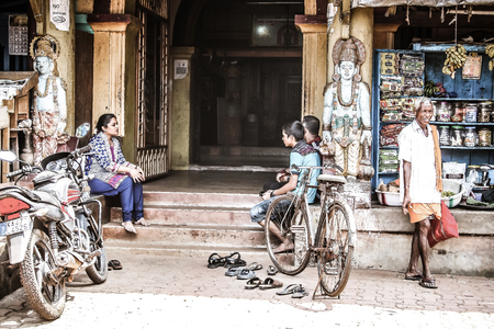 Gokarna Karnataka India October 30, 2017 View of unknown people walking in the main street of Gokarna town in the morningのeditorial素材