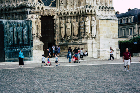 Reims France August 13, 2018 View of unknowns people walking front the Notre Dame Cathedral of Reims in the afternoonのeditorial素材