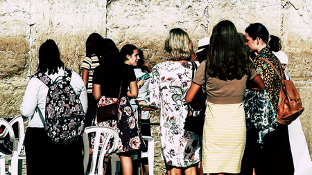 Jerusalem Israel June 18, 2018 View of unknowns woman praying front the Western Wall at the old city of Jerusalem in the morningのeditorial素材