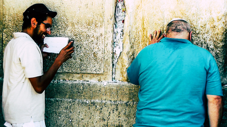 Jerusalem Israel June 18, 2018 View of unknowns people praying front the Western Wall at the old city of Jerusalem in the morningのeditorial素材