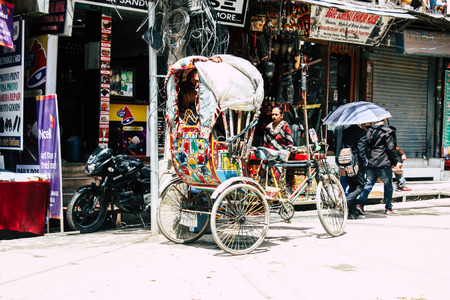 Kathmandu Nepal August 21, 2018 View of unknown Nepali people driving a touk touk in Thamel street...