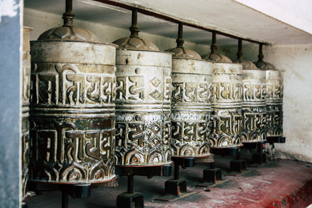 Kathmandu Nepal August 23, 2018 View of Tibetan prayer wheels at the Monkey temple in Swayambhunath area in Kathmandu in the eveningのeditorial素材