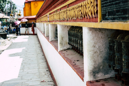 Kathmandu Nepal August 23, 2018 View of Tibetan prayer wheels at the Monkey temple in Swayambhunath area in Kathmandu in the eveningのeditorial素材