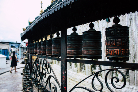 Kathmandu Nepal August 23, 2018 View of Tibetan prayer wheels at the Monkey temple in Swayambhunath area in Kathmandu in the eveningのeditorial素材