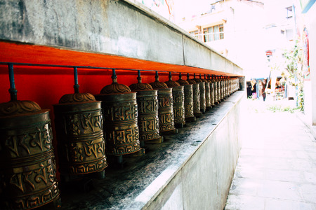 Kathmandu Nepal August 23, 2018 View of Tibetan prayer wheels at the Monkey temple in Swayambhunath area in Kathmandu in the eveningのeditorial素材