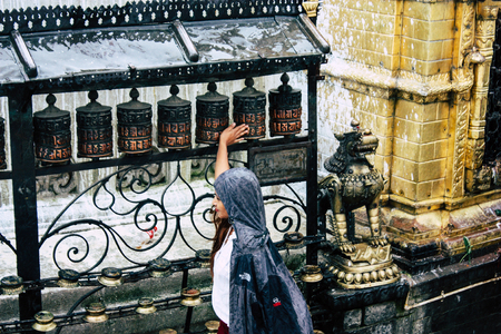 Kathmandu Nepal August 23, 2018 View of Tibetan prayer wheels at the Monkey temple in Swayambhunath area in Kathmandu in the eveningのeditorial素材