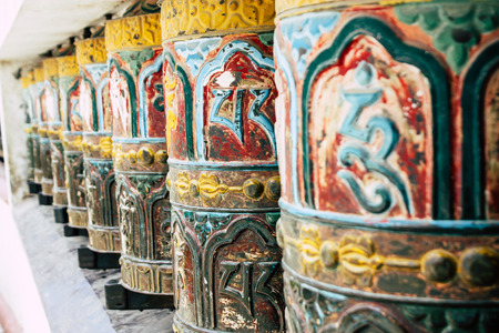 Kathmandu Nepal August 23, 2018 View of Tibetan prayer wheels at the Monkey temple in Swayambhunath area in Kathmandu in the eveningのeditorial素材