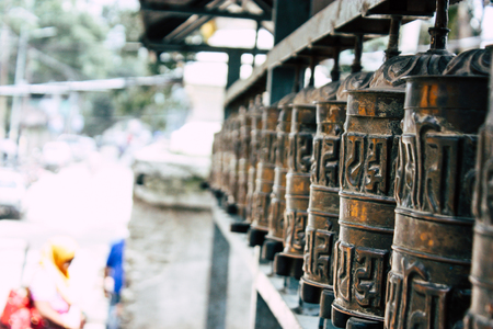 Kathmandu Nepal August 23, 2018 View of Tibetan prayer wheels at the Monkey temple in Swayambhunath area in Kathmandu in the eveningのeditorial素材