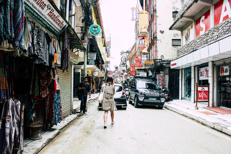 Kathmandu Nepal August 24, 2018 View of unknowns Nepali people walking in Thamel street in Kathmandu in the eveningのeditorial素材