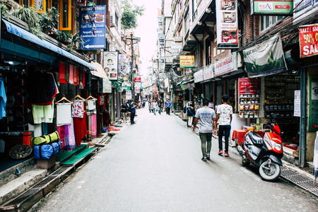 Kathmandu Nepal August 24, 2018 View of unknowns Nepali people walking in Thamel street in Kathmandu in the eveningのeditorial素材