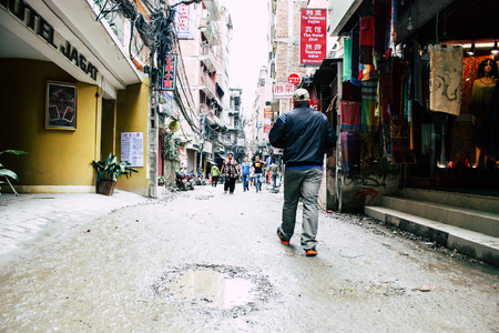 Kathmandu Nepal August 24, 2018 View of unknowns Nepali people walking in Thamel street in Kathmandu in the eveningのeditorial素材