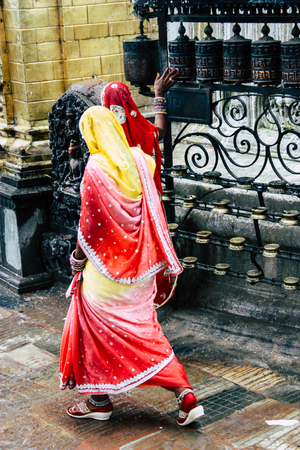 Kathmandu Nepal August 23, 2018 View of unknowns people praying at the Monkey temple located Swayambhunath district in Kathmandu in the eveningのeditorial素材