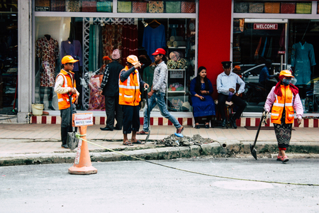 Kathmandu Nepal August 26, 2018 View of unknowns Nepali worker cleaning the street at Thamel district in Kathmandu in the afternoonのeditorial素材