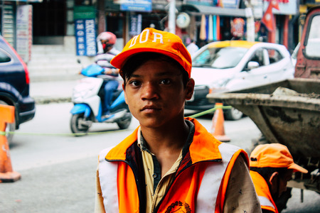 Kathmandu Nepal August 26, 2018 View of unknowns Nepali worker cleaning the street at Thamel district in Kathmandu in the afternoonのeditorial素材