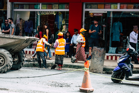 Kathmandu Nepal August 26, 2018 View of unknowns Nepali worker cleaning the street at Thamel district in Kathmandu in the afternoonのeditorial素材