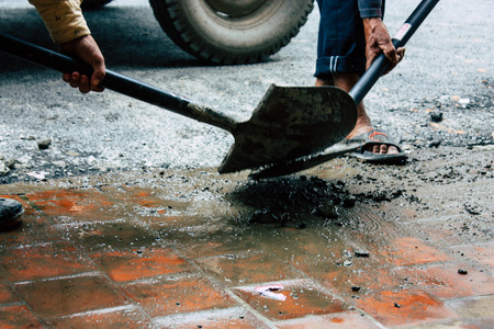 Kathmandu Nepal August 26, 2018 View of unknowns Nepali worker cleaning the street at Thamel district in Kathmandu in the afternoonのeditorial素材
