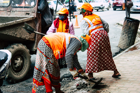 Kathmandu Nepal August 26, 2018 View of unknowns Nepali worker cleaning the street at Thamel district in Kathmandu in the afternoonのeditorial素材