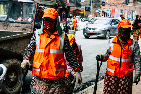 Kathmandu Nepal August 26, 2018 View of unknowns Nepali worker cleaning the street at Thamel district in Kathmandu in the afternoonのeditorial素材