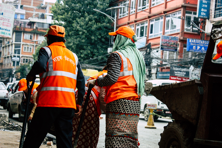 Kathmandu Nepal August 26, 2018 View of unknowns Nepali worker cleaning the street at Thamel district in Kathmandu in the afternoonのeditorial素材