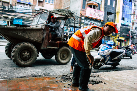 Kathmandu Nepal August 26, 2018 View of unknowns Nepali worker cleaning the street at Thamel district in Kathmandu in the afternoonのeditorial素材