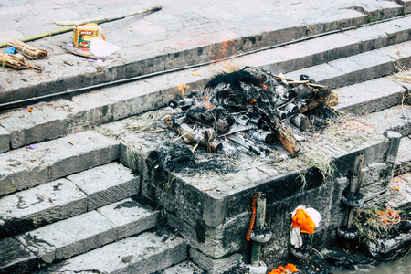 Kathmandu Nepal August 27, 2018 View of the cremation site of a dead body front the river at the temple of Pashupatinath in the afternoonのeditorial素材