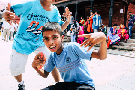 Kathmandu Nepal August 27, 2018 Portrait of unknown Hindu kid visiting the Pashupatinath temple in the morningのeditorial素材