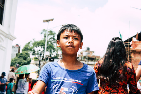 Kathmandu Nepal August 27, 2018 Portrait of unknown Hindu kid visiting the Pashupatinath temple in...