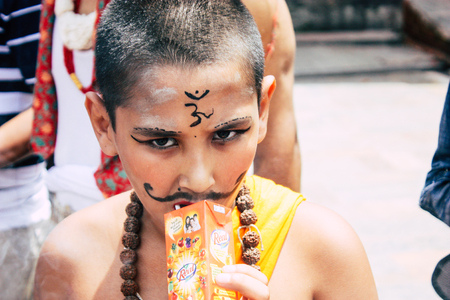 Kathmandu Nepal August 27, 2018 Portrait of unknown Hindu kid visiting the Pashupatinath temple in the morningのeditorial素材