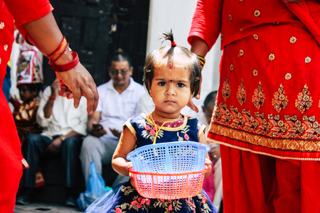 Kathmandu Nepal August 27, 2018 Portrait of unknown Hindu kid visiting the Pashupatinath temple in...