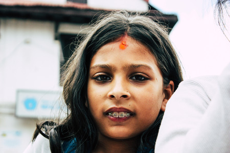 Kathmandu Nepal August 27, 2018 Portrait of unknown Hindu kid visiting the Pashupatinath temple in the morningのeditorial素材