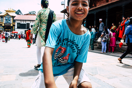 Kathmandu Nepal August 27, 2018 Portrait of unknown Hindu kid visiting the Pashupatinath temple in the morningのeditorial素材